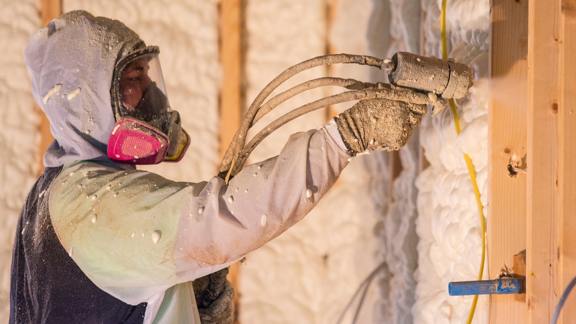 Go Green Spray Foam Professionals insulating a commercial space for energy efficiency.