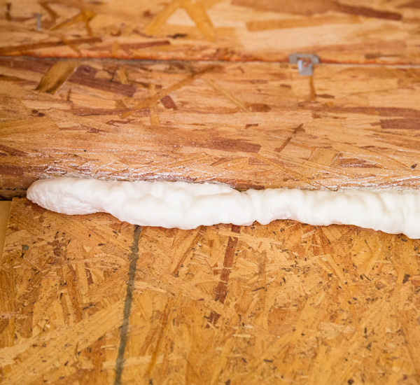 Fiberglass insulation installed in walls for increased thermal efficiency.