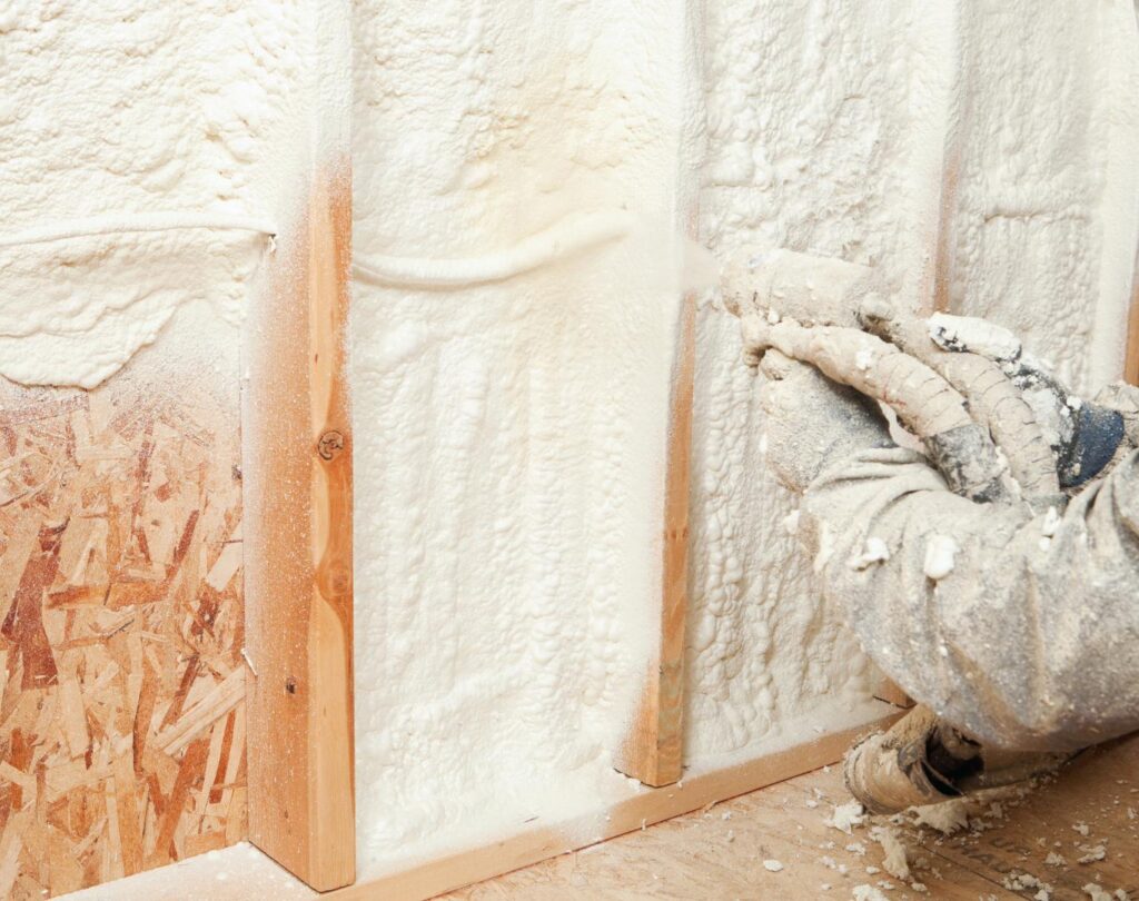 Insulation contractor in Chattanooga, TN applying spray foam in a residential attic