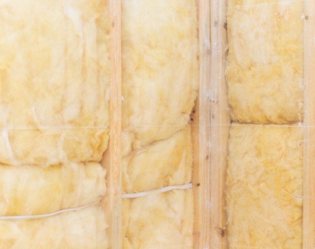 Fiberglass insulation in East Ellijay, GA being installed in a residential attic